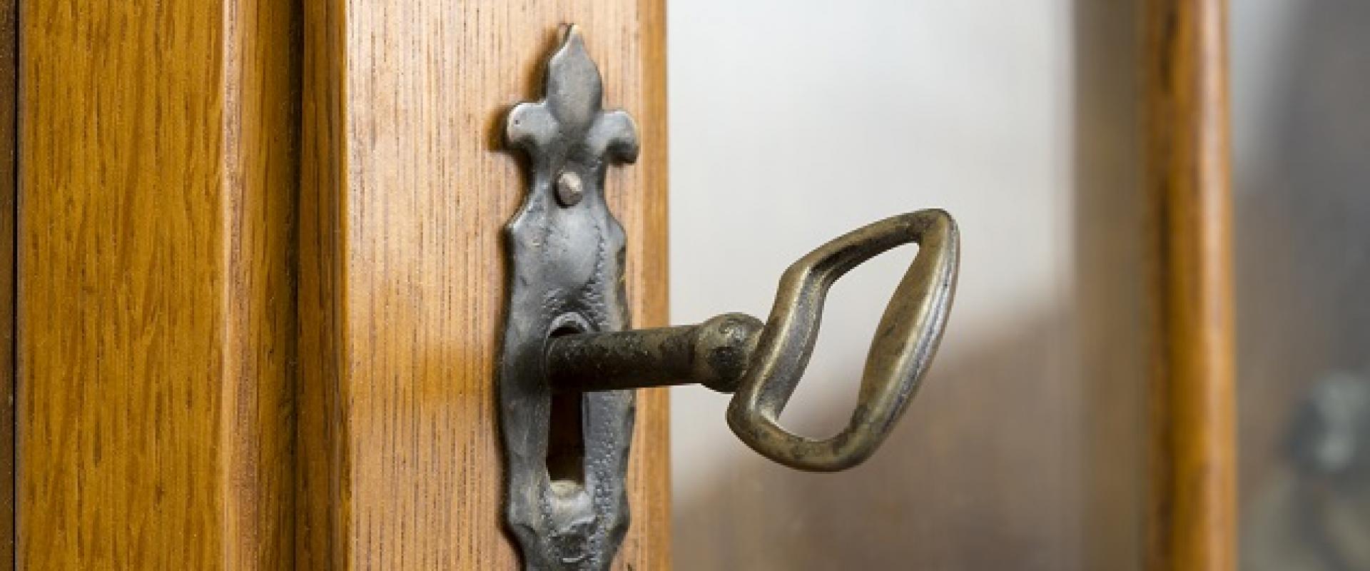 key in a half open door lock