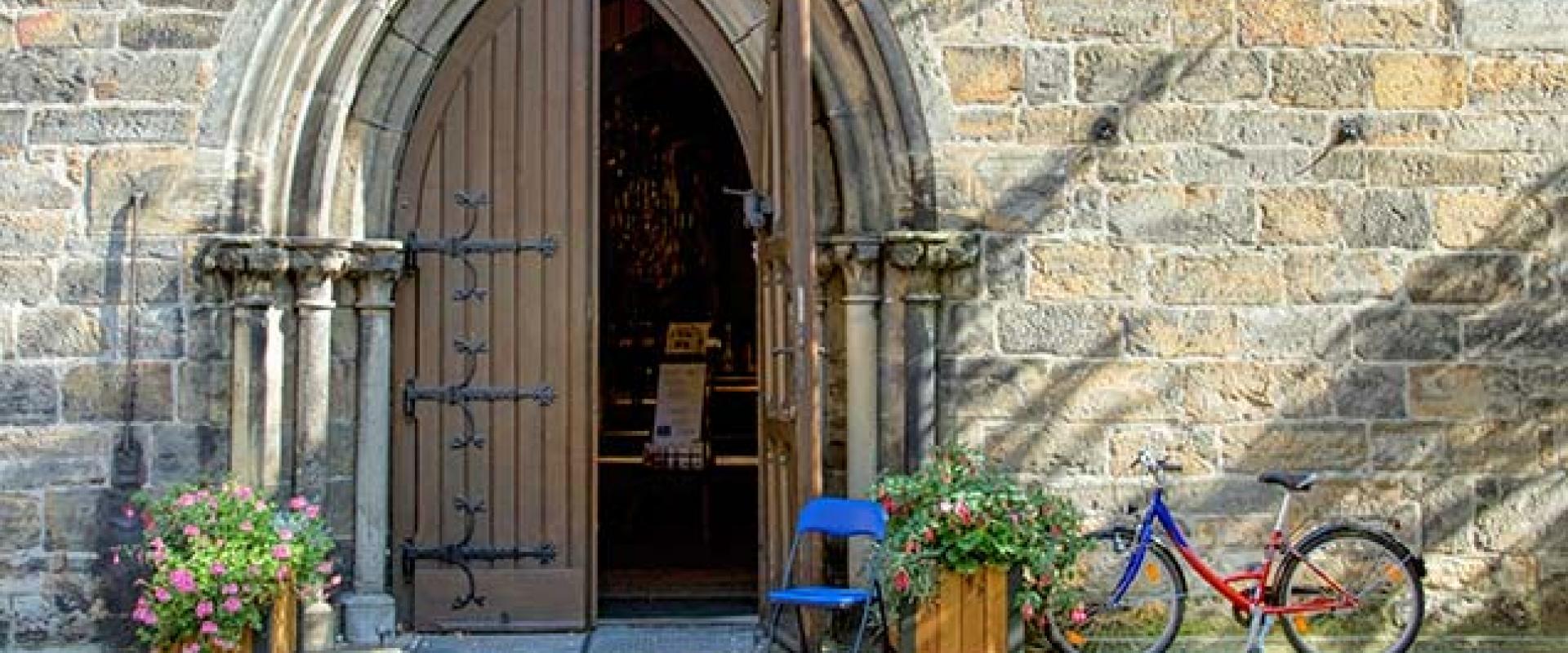 exterior image of church with door half open