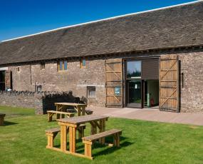 Tretower Court Barn - rear exterior view from grassed picnic area
